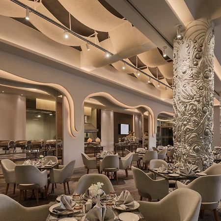 Mirage Hotel & Conference Center Alexandria Exterior photo The restaurant