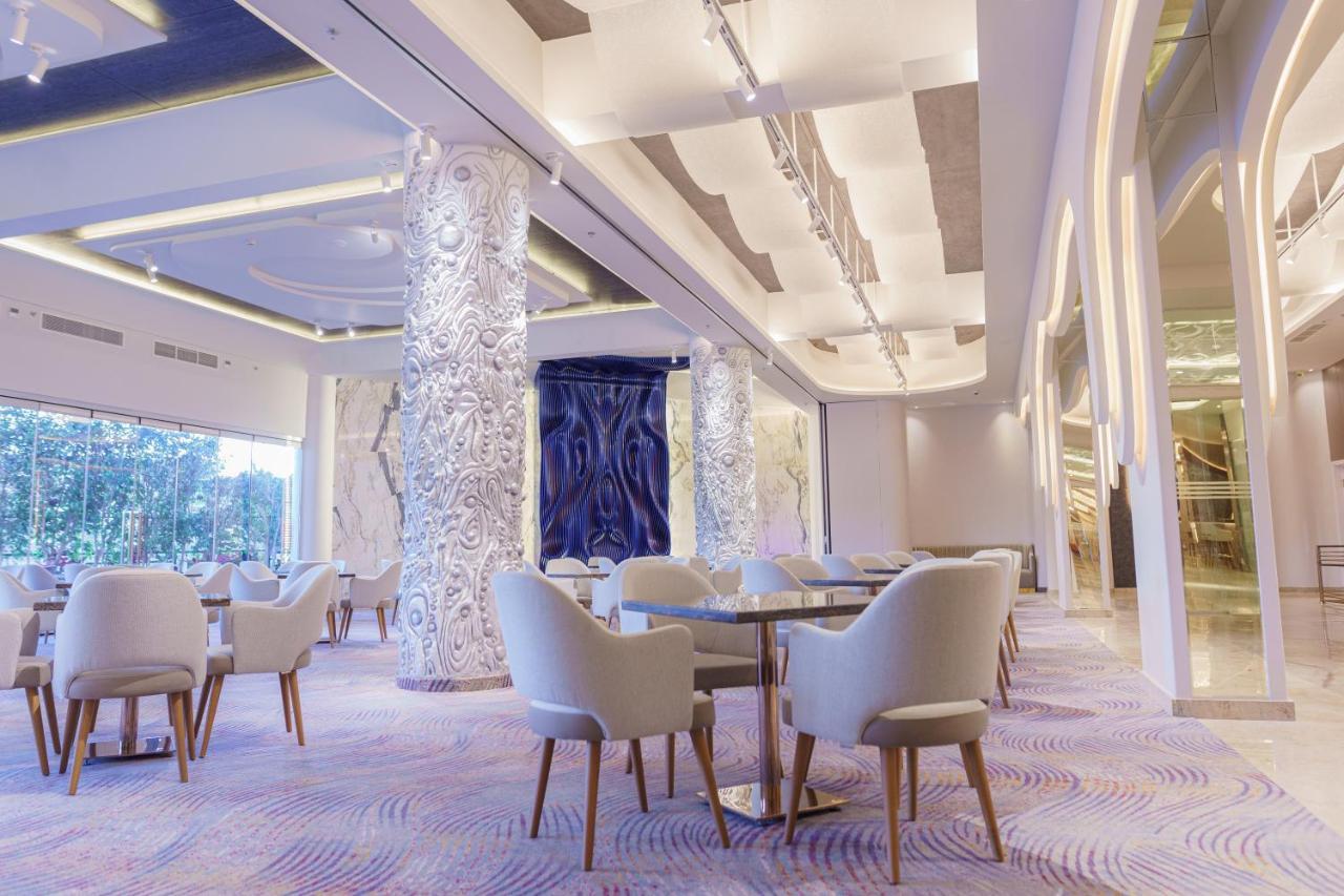 Mirage Hotel & Conference Center Alexandria Exterior photo The interior of the hotel