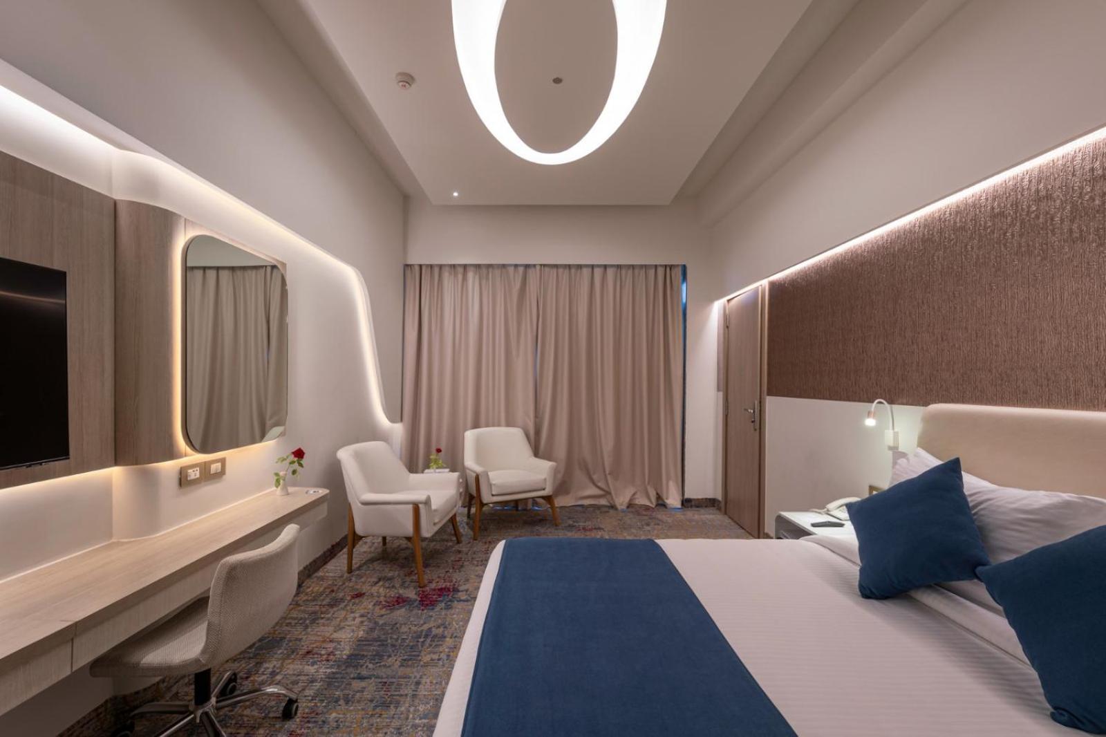 Mirage Hotel & Conference Center Alexandria Exterior photo A room at the hotel