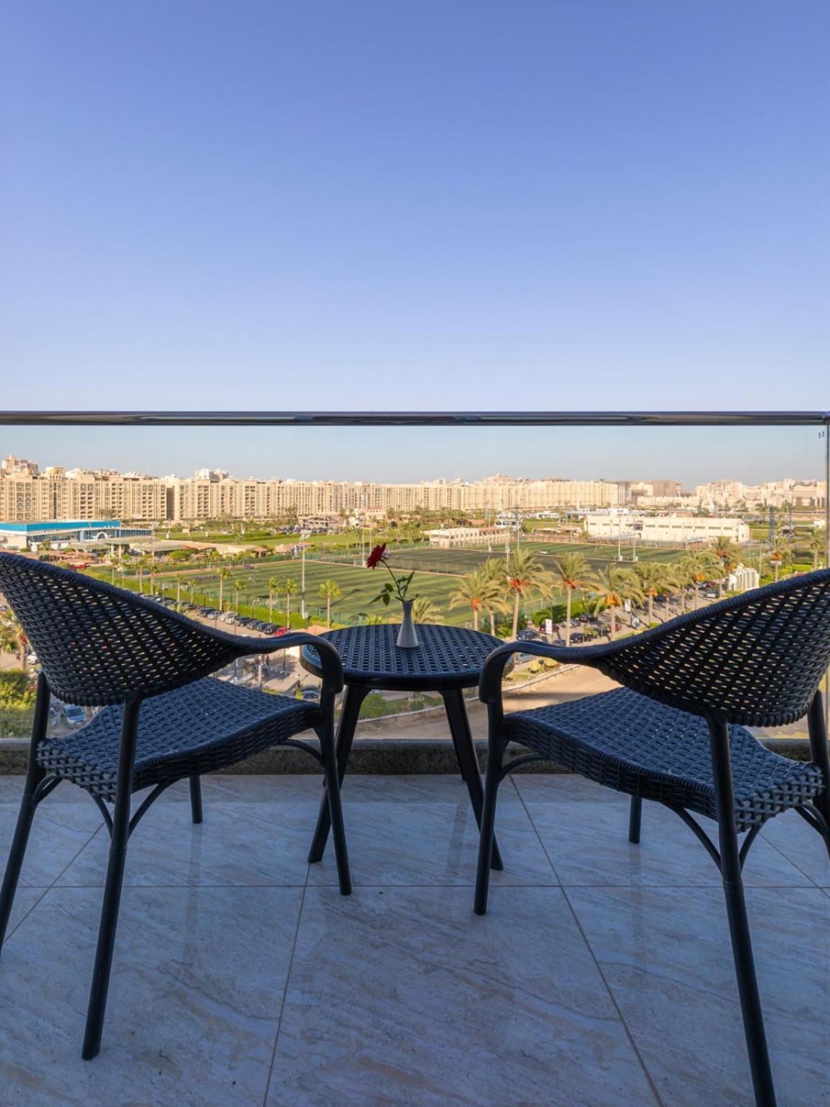 Mirage Hotel & Conference Center Alexandria Exterior photo View from the balcony of a suite at the hotel