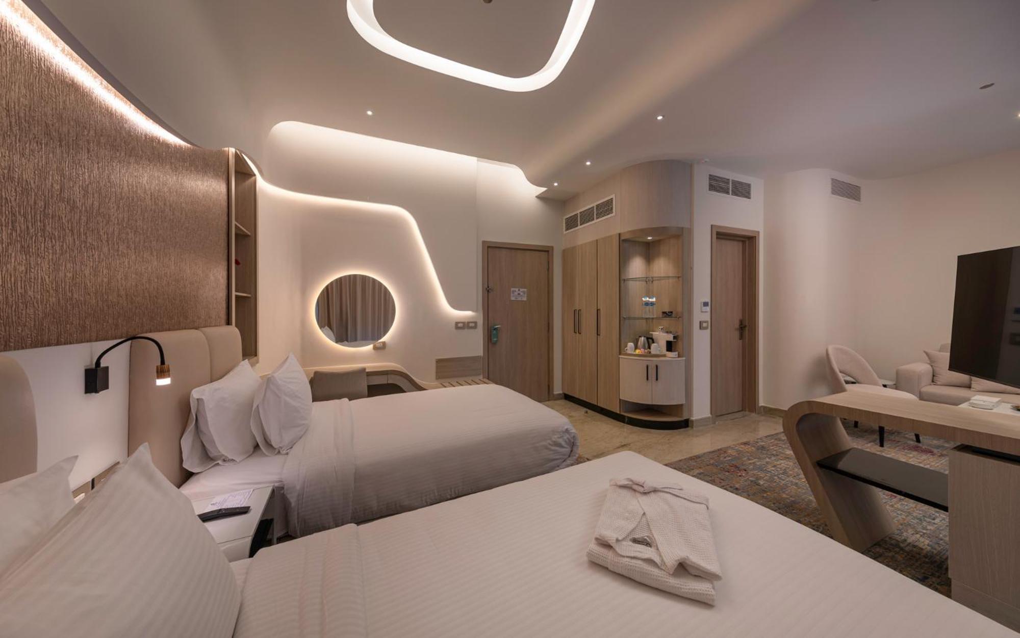 Mirage Hotel & Conference Center Alexandria Exterior photo A room at the hotel